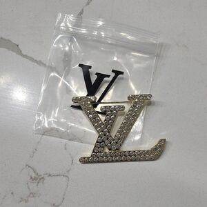 Gold-Tone Crystal Inspired Logo Brooch